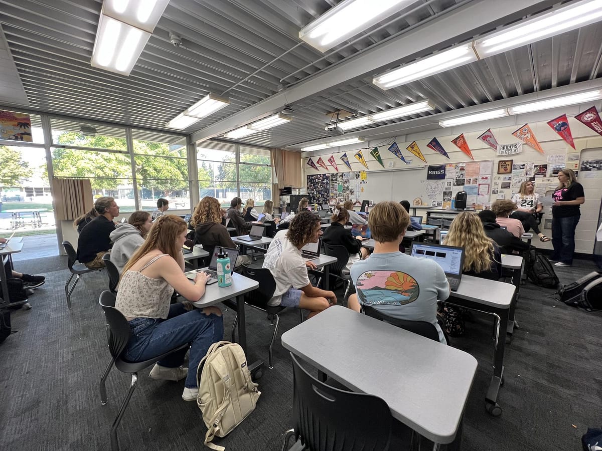 Students work on Dual Enrollment English during Jolynn Mason's class.