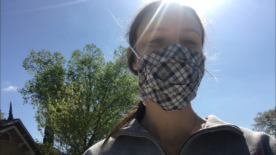 Senior Samantha Klein wears a mask on one of her walks outside, enjoying the fresh air.